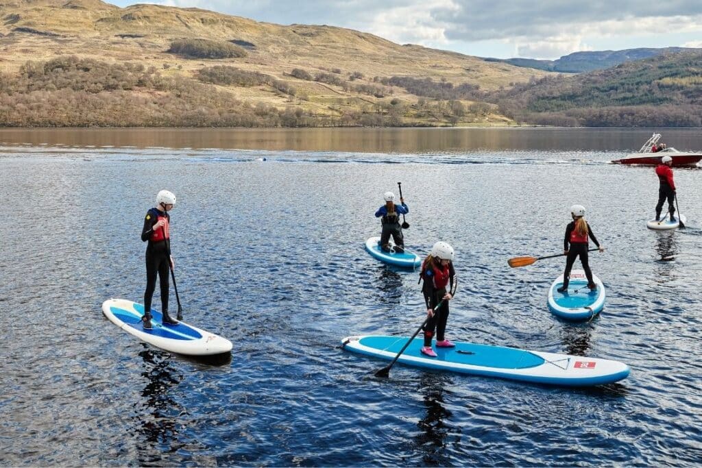 paddle boarding on a loch