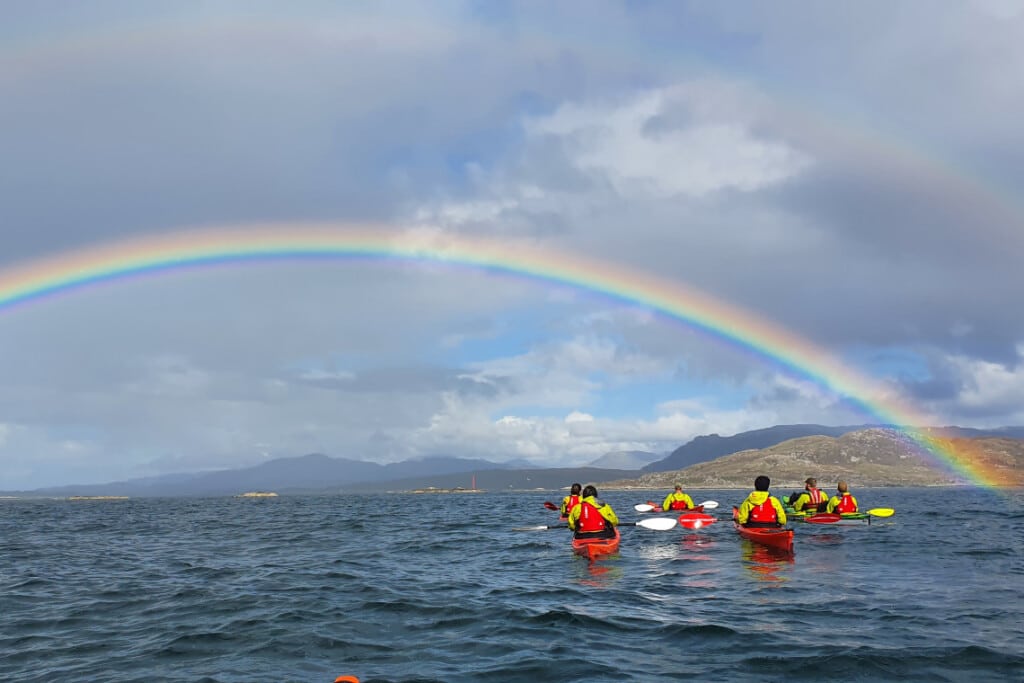 Sea kayaking under a rainbow, west coast scotland